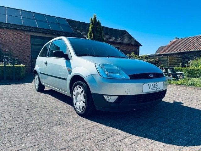 Ford Fiesta 1.25 Benzine * Garantie * Euro4 *, Auto's, Stof, 1242 cc, 4 cilinders, Grijs