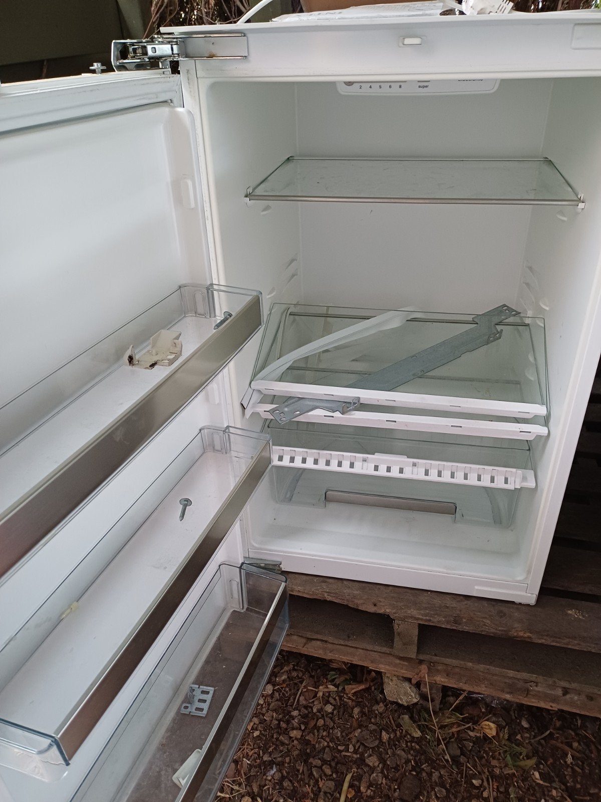 gratis werkende inbouwfrigo, Enlèvement