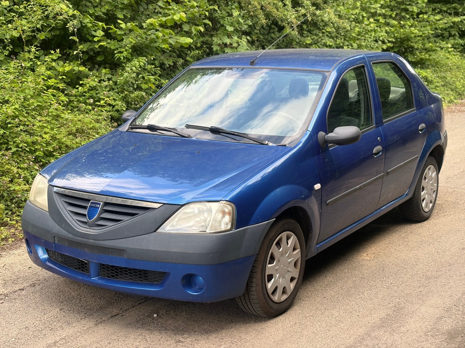 Dacia Logan 1.4 MPI, Autos, Achat, 4 portes, Entreprise, Boîte manuelle