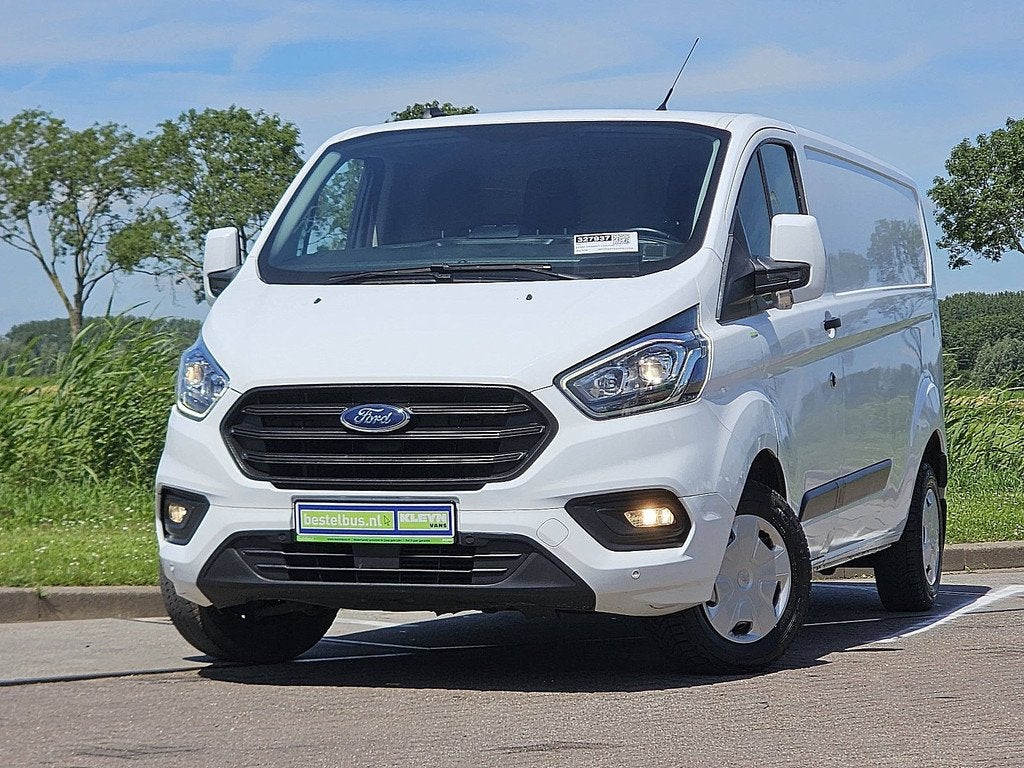Ford Transit Custom 300 2.0 TDCI L1H2 Trend WF0YXXTTGYPS1370, Auto's, Voorwielaandrijving, Stof, 4 cilinders, Wit