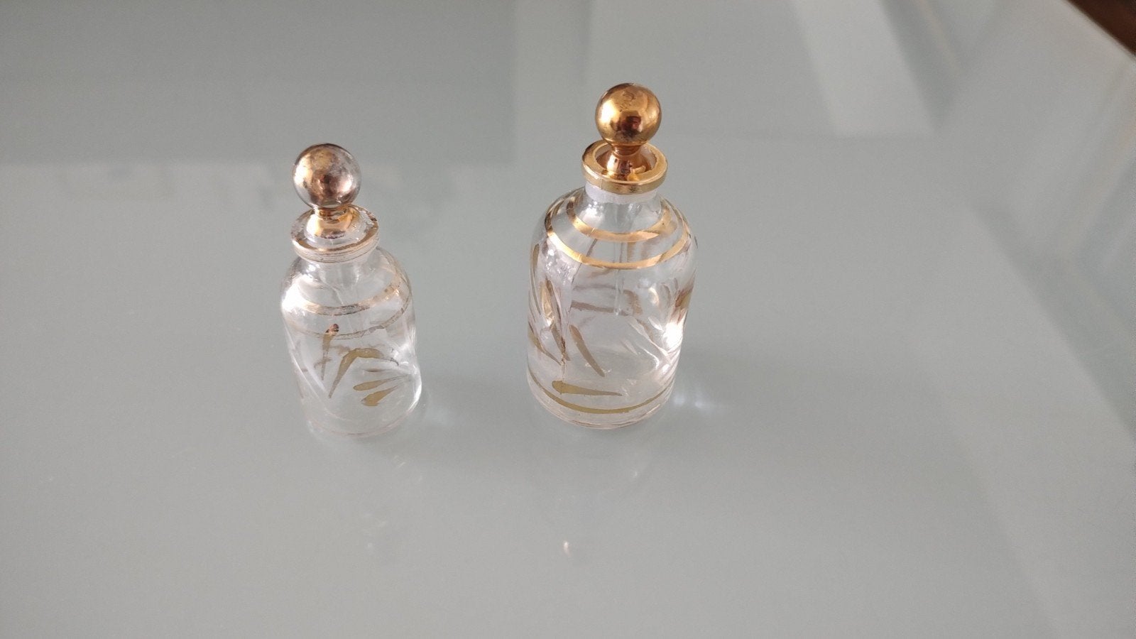 Parfumflesjes, Ophalen