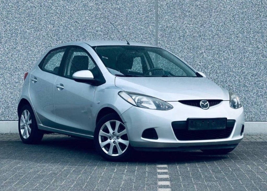 MAZDA 2 1.3 ACTIVE 2008 140.000KM!-AIRCO!-GEKEURD VR.VRKP!, Auto's, Mazda, Voorwielaandrijving, Stof, Zwart, 4 cilinders
