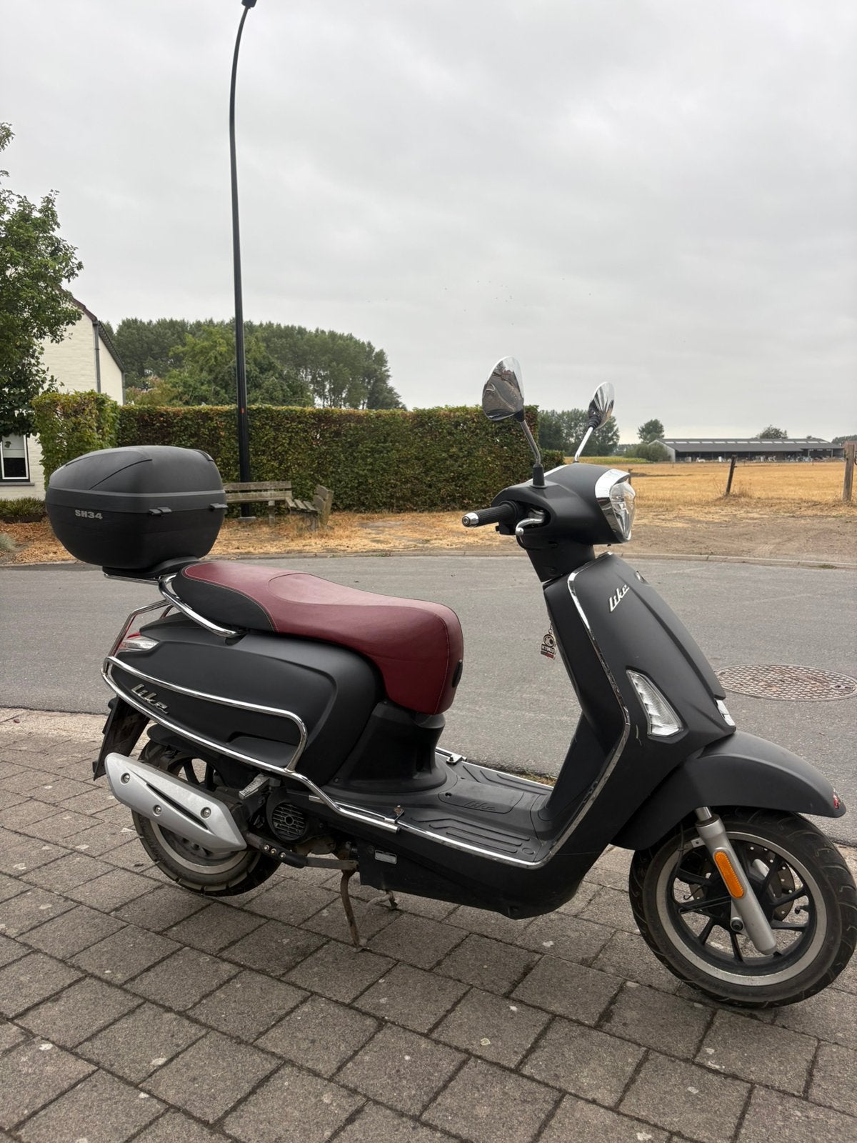 Scooter a klasse, Ophalen, Kymco