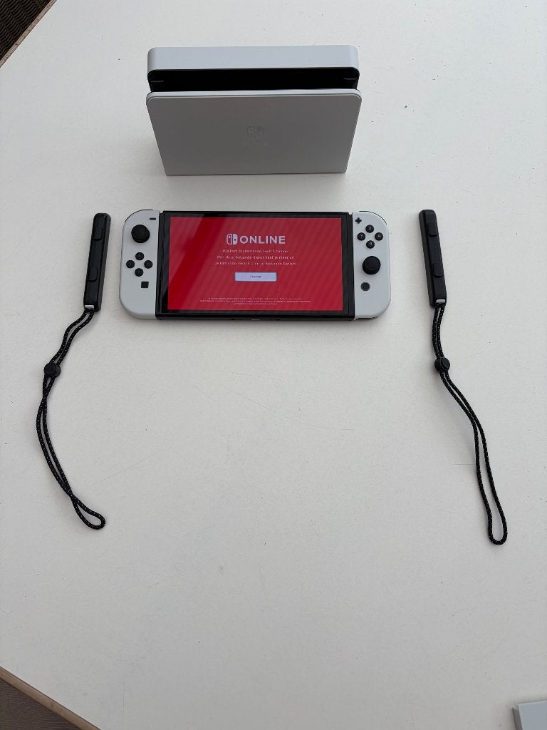 Nintendo Switch OLED Wit + Dock + Joy-Cons, Games en Spelcomputers, Spelcomputers | Nintendo Switch, Ophalen of Verzenden, Zo goed als nieuw