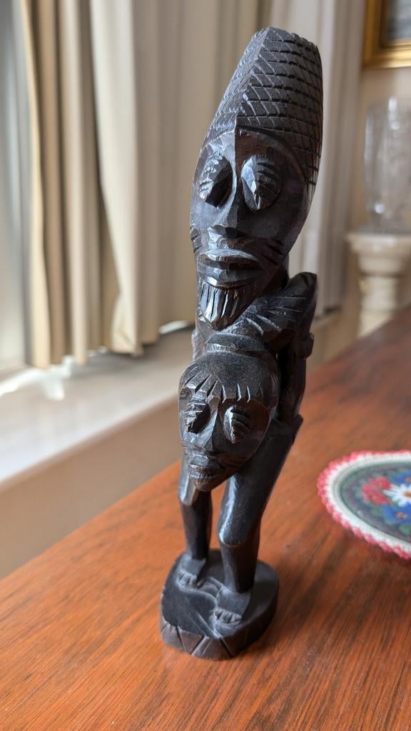 Beeldje vanuit de Kongo, Enlèvement ou Envoi
