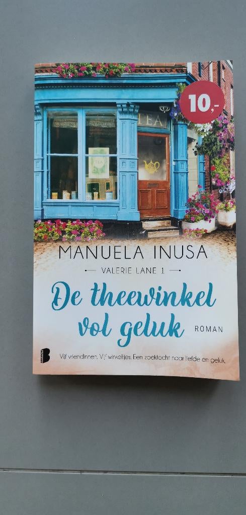 Roman De theewinkel vol geluk Manuela Inusa NL Paperback, Boeken, België, Manuela Inusa, Ophalen, Gelezen