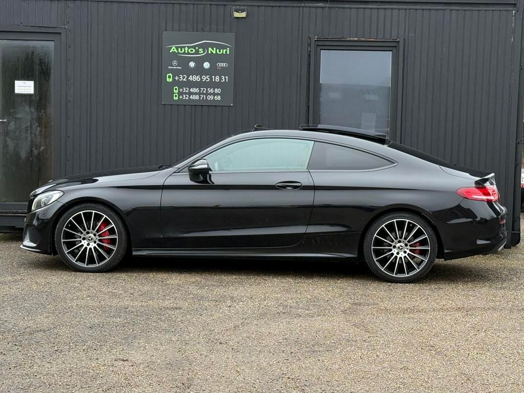 Mercedes-benz c220d coupe 2018 amg pano leder 12M GARANTIE, Automaat, Achterwielaandrijving, Euro 6, Zwart