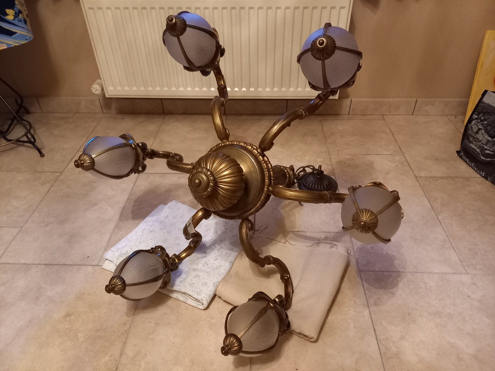 Bronzen luster, Ophalen