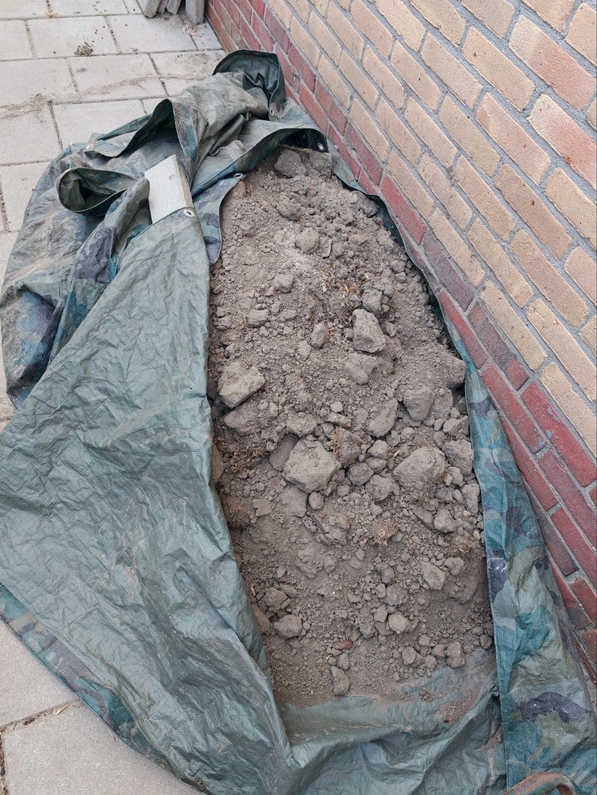 Gratis ruim halve kuub grond, Enlèvement