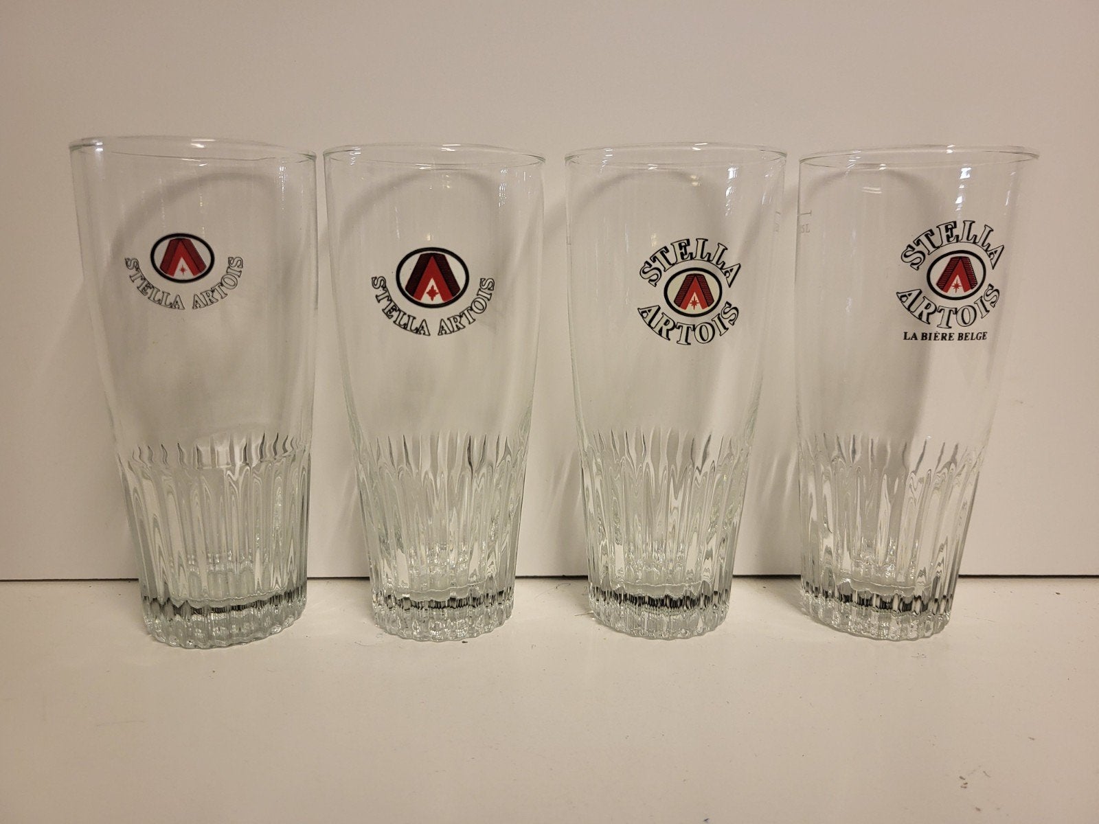 4 verschillende Stella Artois glazen, Verzamelen, Ophalen of Verzenden, Stella Artois