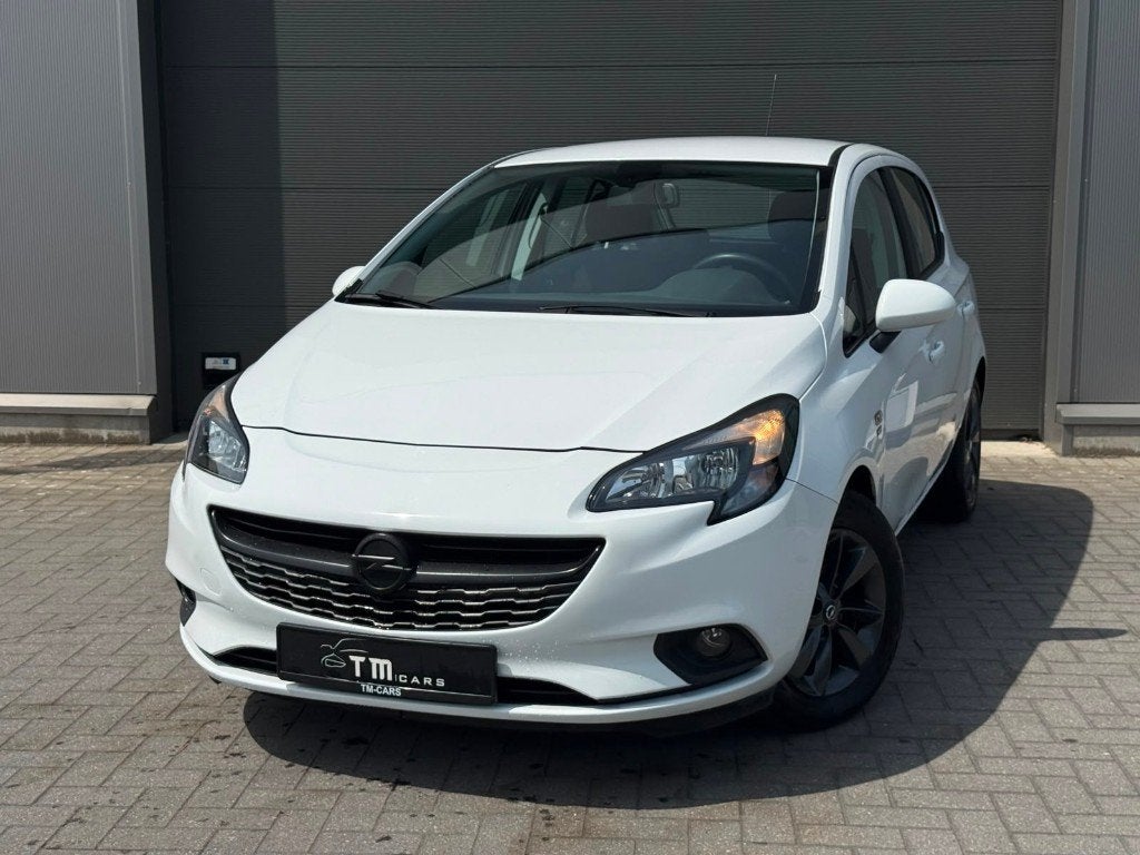 Opel Corsa navigatie cruise controle, Auto's, Voorwielaandrijving, Stof, 4 cilinders, Wit