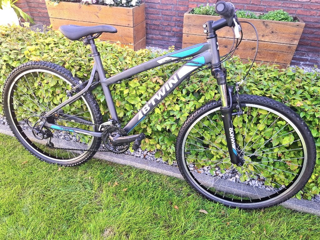 Als nieuw, Rockrider ST340 mountainbike maat M + voorvering, Fietsen en Brommers, Gebruikt, Velgrem, Rockrider, Handrem