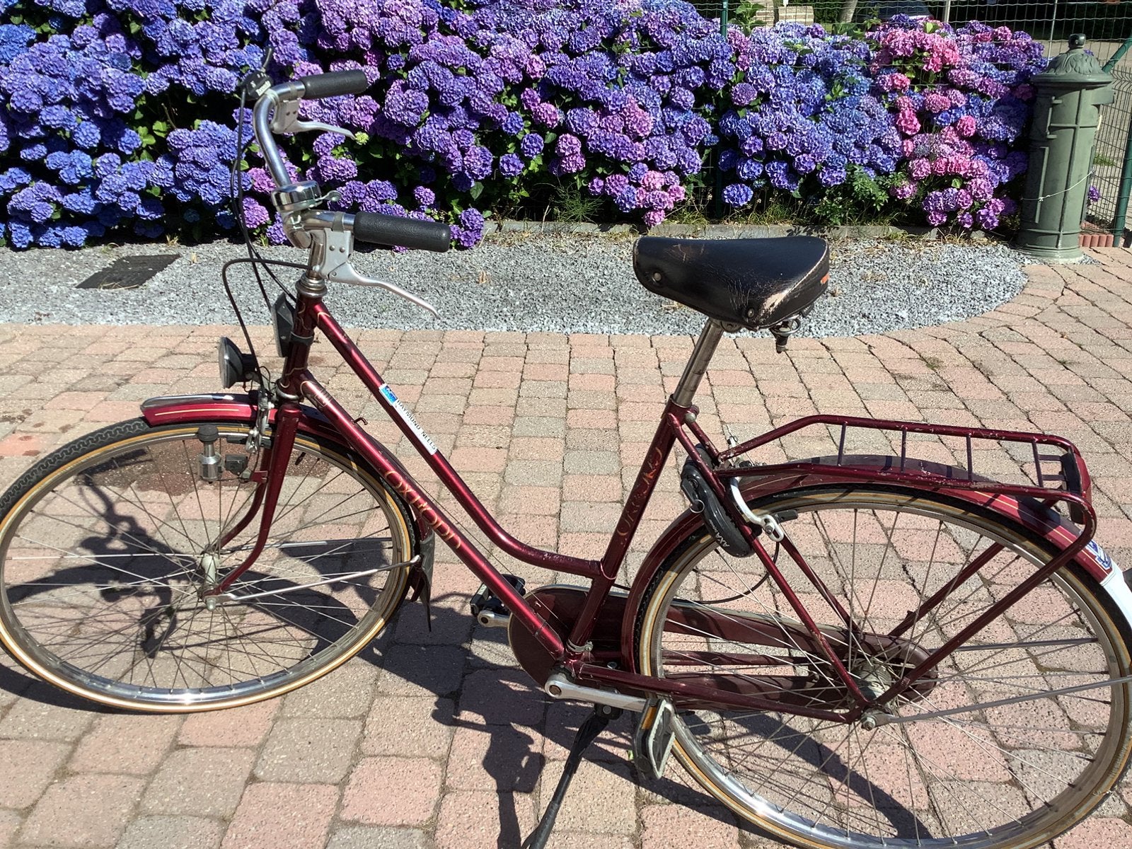 Damesfiets., Ophalen