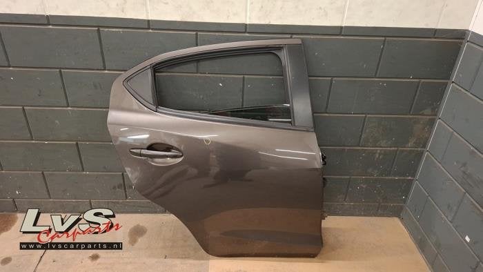 Portier 4Deurs rechts-achter van een Mazda 2 (42F), Auto-onderdelen, Carrosserie, Deur, Mazda, Gebruikt, 3 maanden garantie, Ophalen of Verzenden