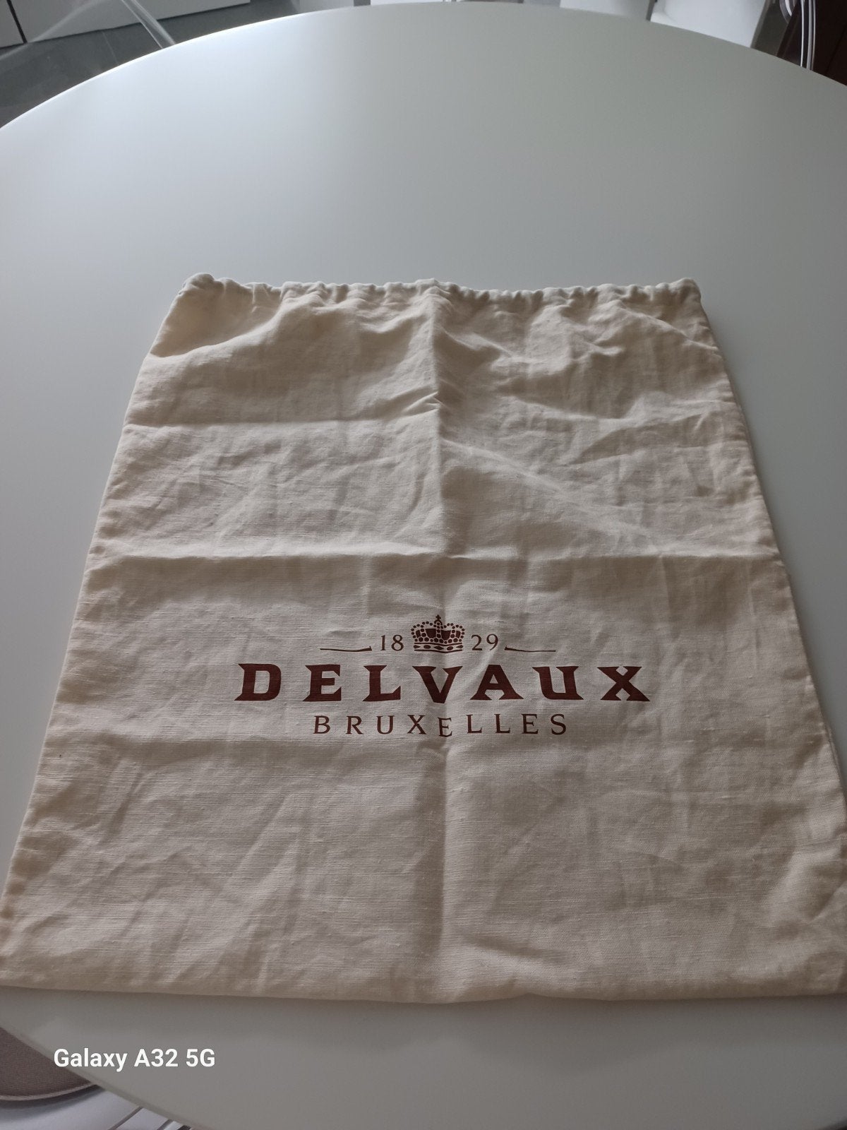 DELVAUX Housse pour sac GM silgée, Envoi