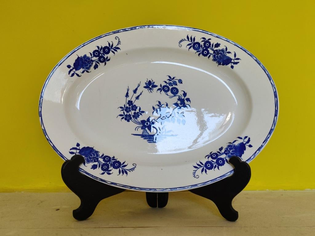 Decoratief bord van Boch, Ophalen