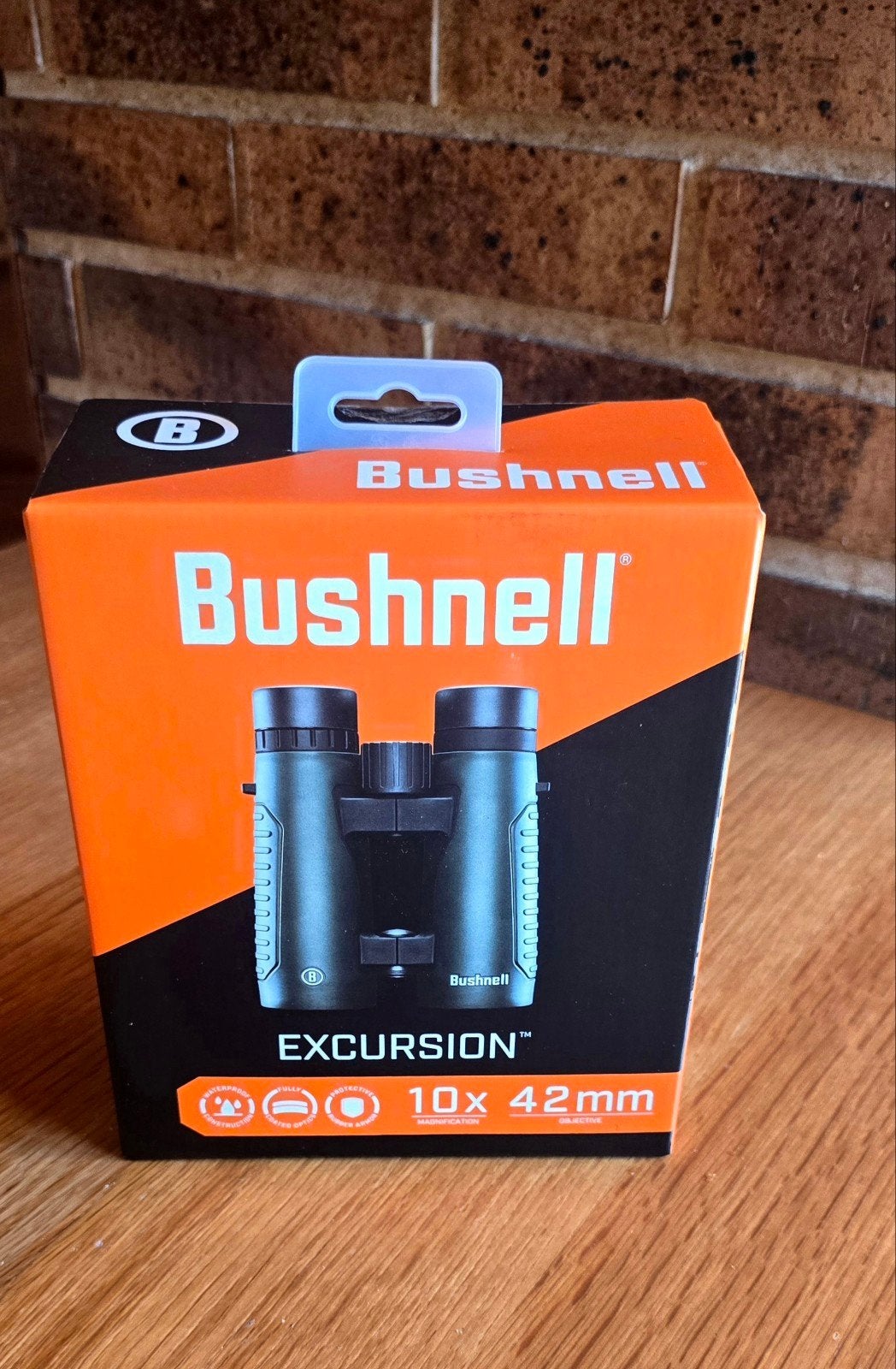 JUMELLE BUSHNELL EXCURSION 10X42.   NEUVE, Envoi