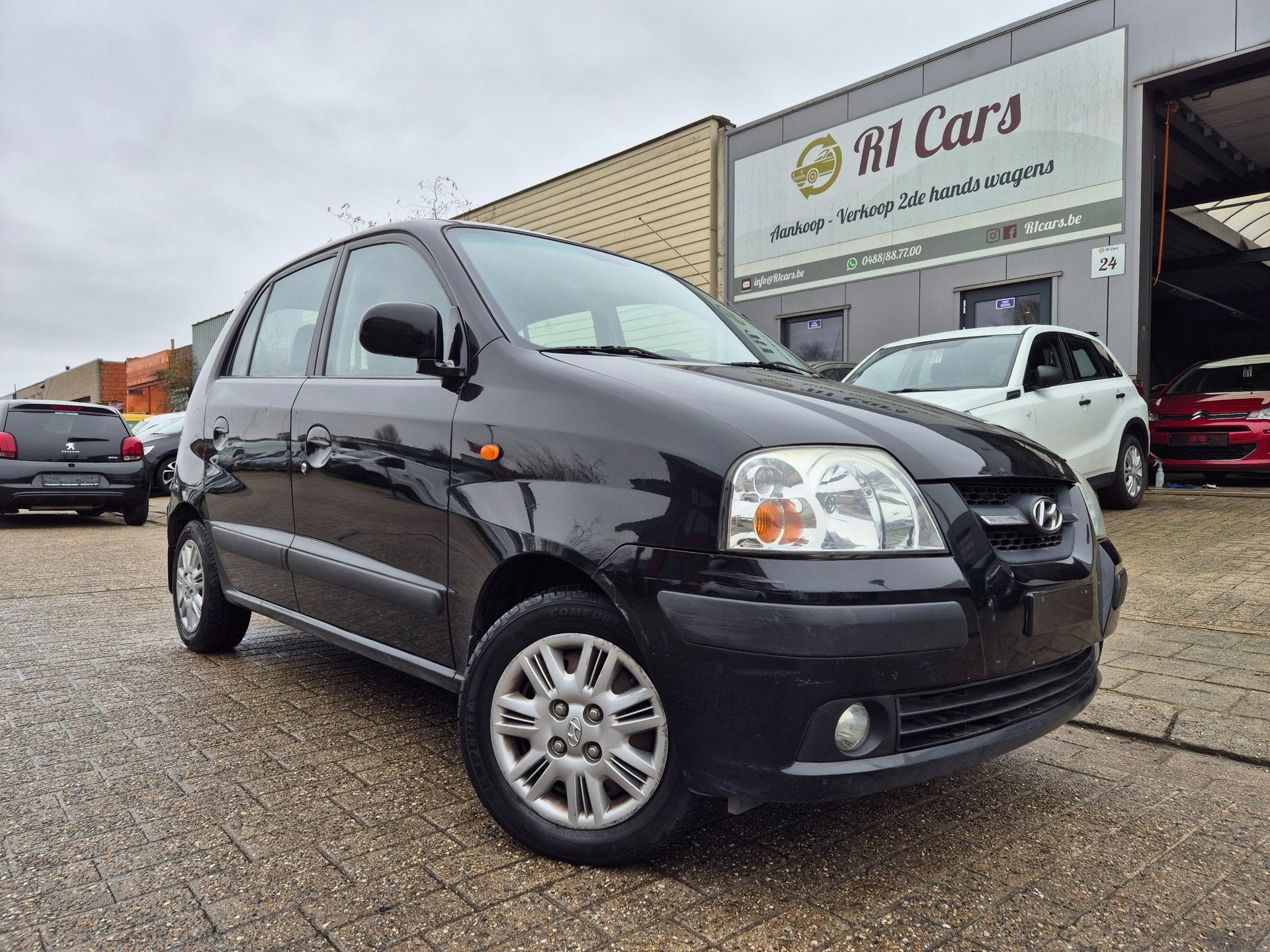Hyundai Atos 1.0i met 100.000km/OHB/12Maand Garantie!, Voorwielaandrijving, Stof, 4 cilinders, Zwart