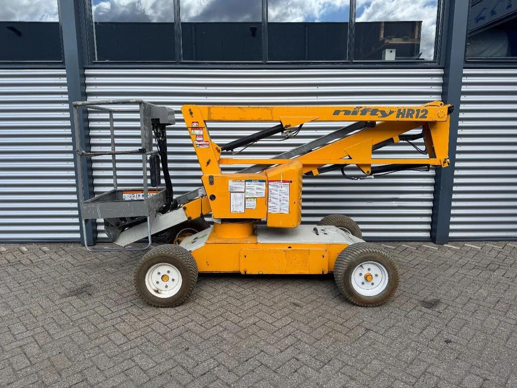 Niftylift HR12NE Hoogwerker Knikarmhoogwerker (bj 2012), Zakelijke goederen, Machines en Bouw | Liften, Steigers en Ladders