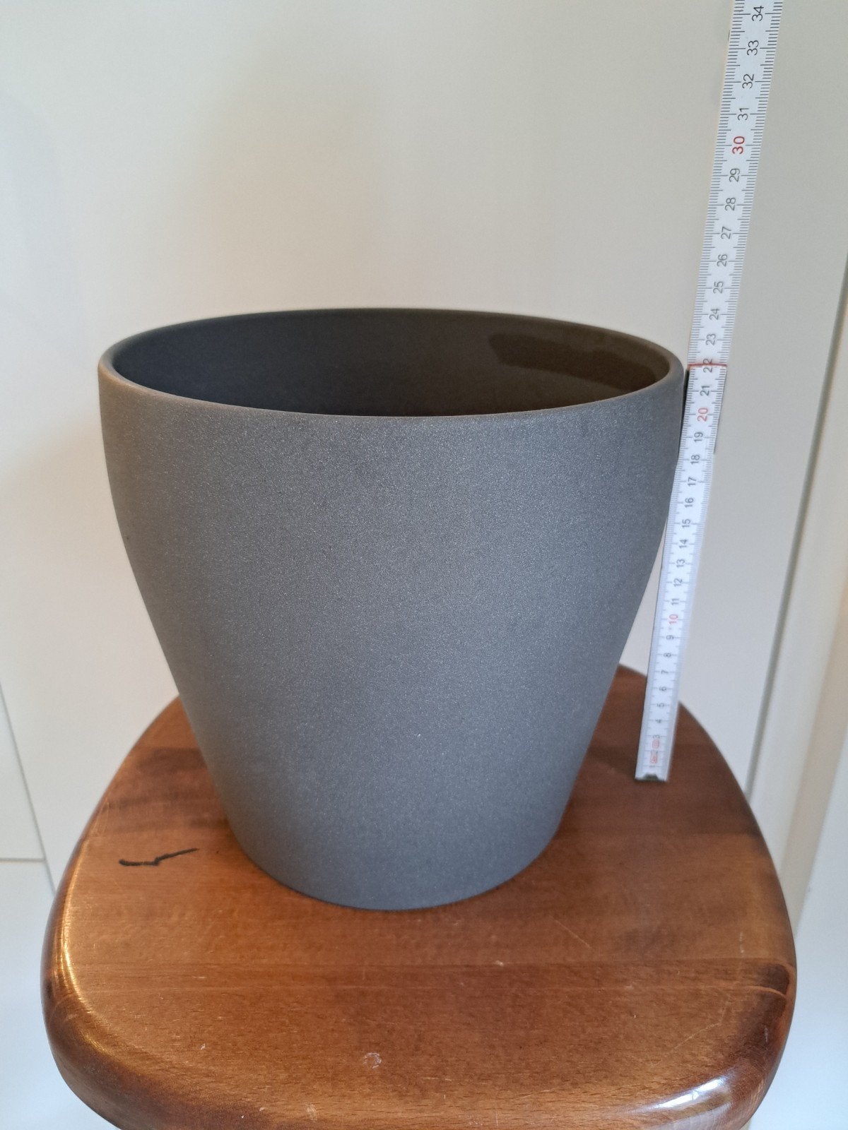 stenen bloempot, Ophalen