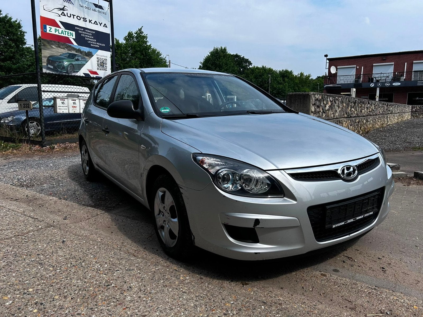 Hyundai i30 1.4 benziene 163000 km bij 2009, Auto's, Voorwielaandrijving, 4 deurs, Stof, Zwart