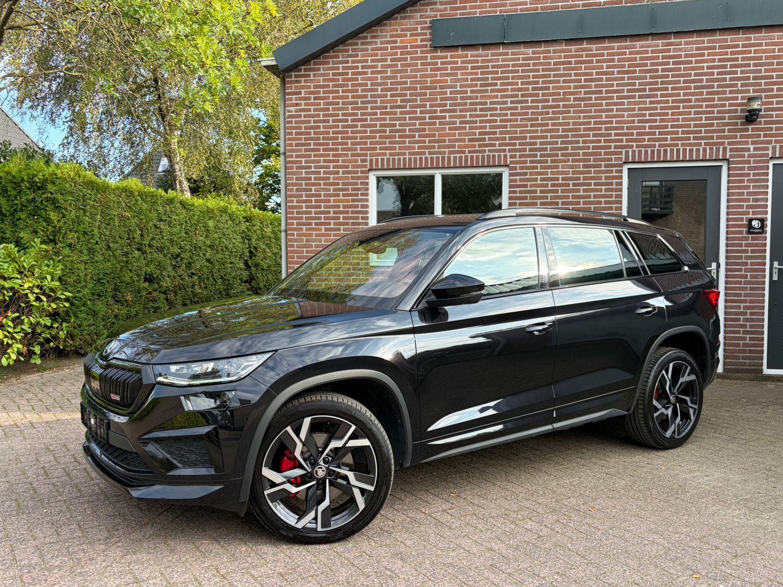 Kodiaq RS 245pk 4x4 acc, 360 cam, soundbooster., Auto's, Automaat, 4 cilinders, Leder en Stof, Zwart