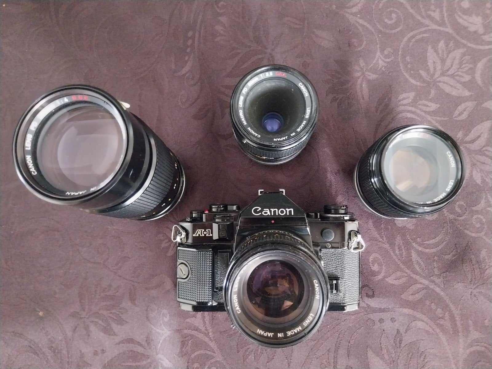 Canon A1 met lenzen te koop, Audio, Tv en Foto, Ophalen of Verzenden, Canon