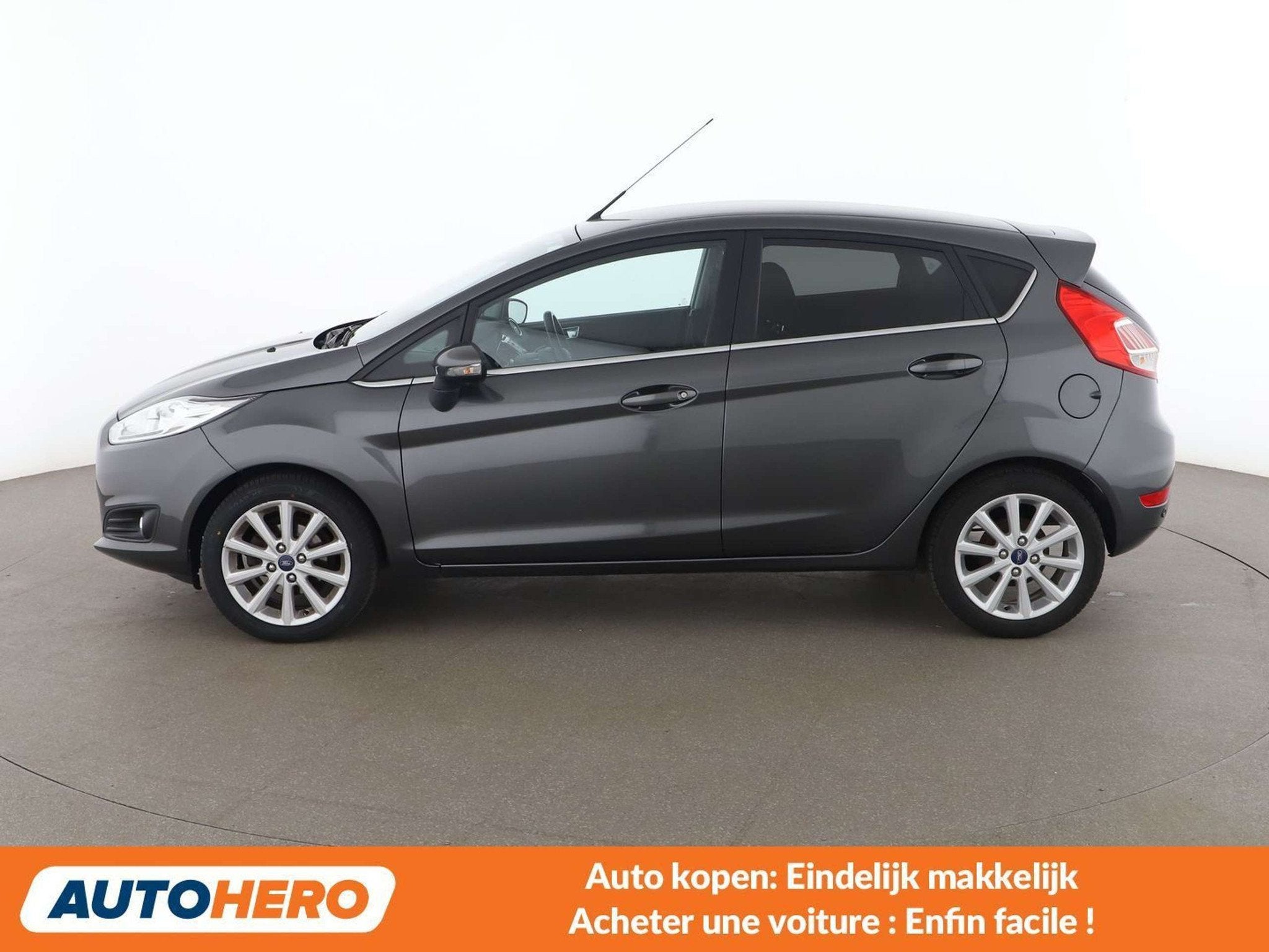 Ford Fiesta 1.0 EcoBoost Titanium (bj 2016), Auto's, Voorwielaandrijving, Euro 5, Stof, Gebruikt