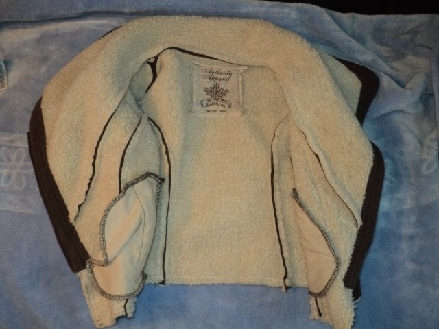 une belle veste sans manches bien chaude taille 11 ans, Kinderen en Baby's, Kinderkleding | Maat 146, Ophalen of Verzenden
