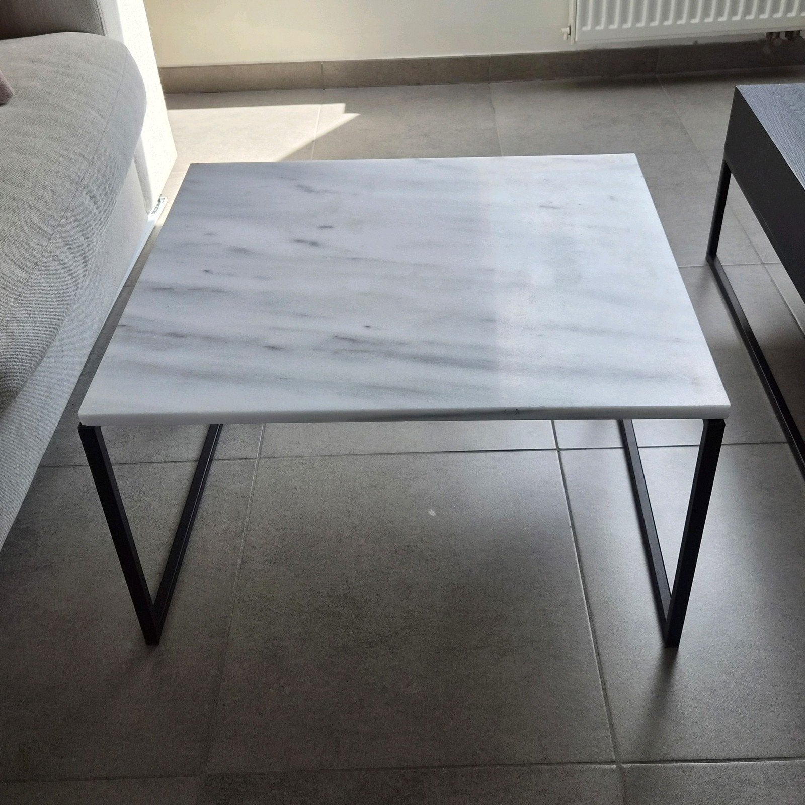 marmeren bijzettafel, Ophalen