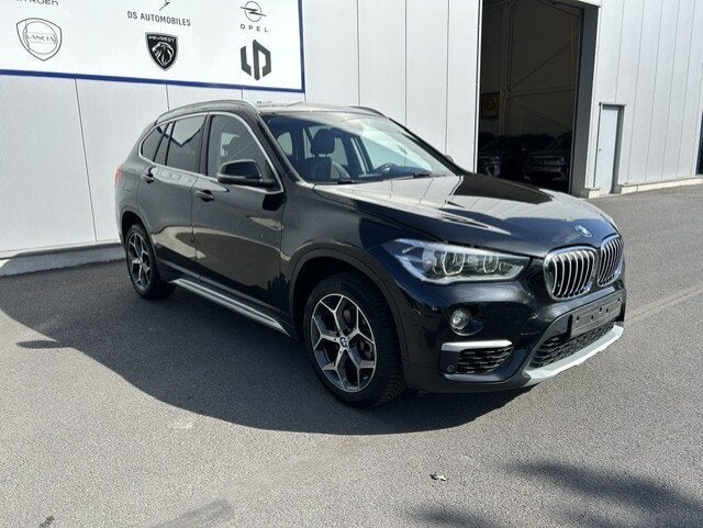 BMW iX1 1.5i sDrive18, 4 cilinders, Zwart, Bedrijf, 5 deurs