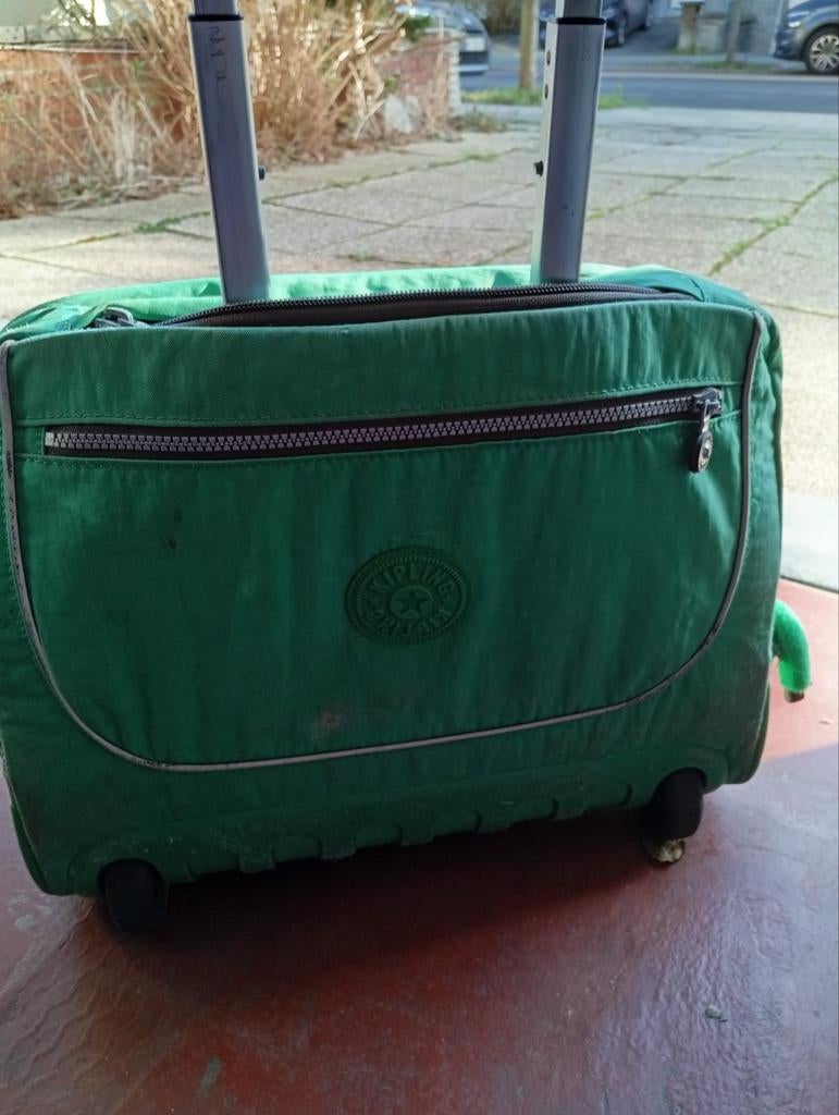 Cartable à roulettes Kipling, Ophalen