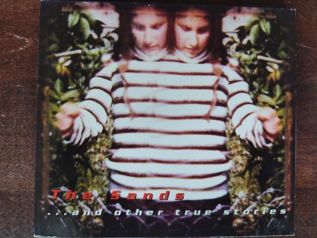 CD : THE SANDS - ...AND OTHER TRUE STORIES, Ophalen of Verzenden, Zo goed als nieuw