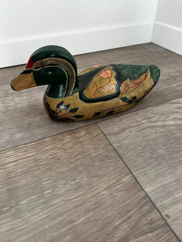 Handgesneden houten eend, Enlèvement ou Envoi