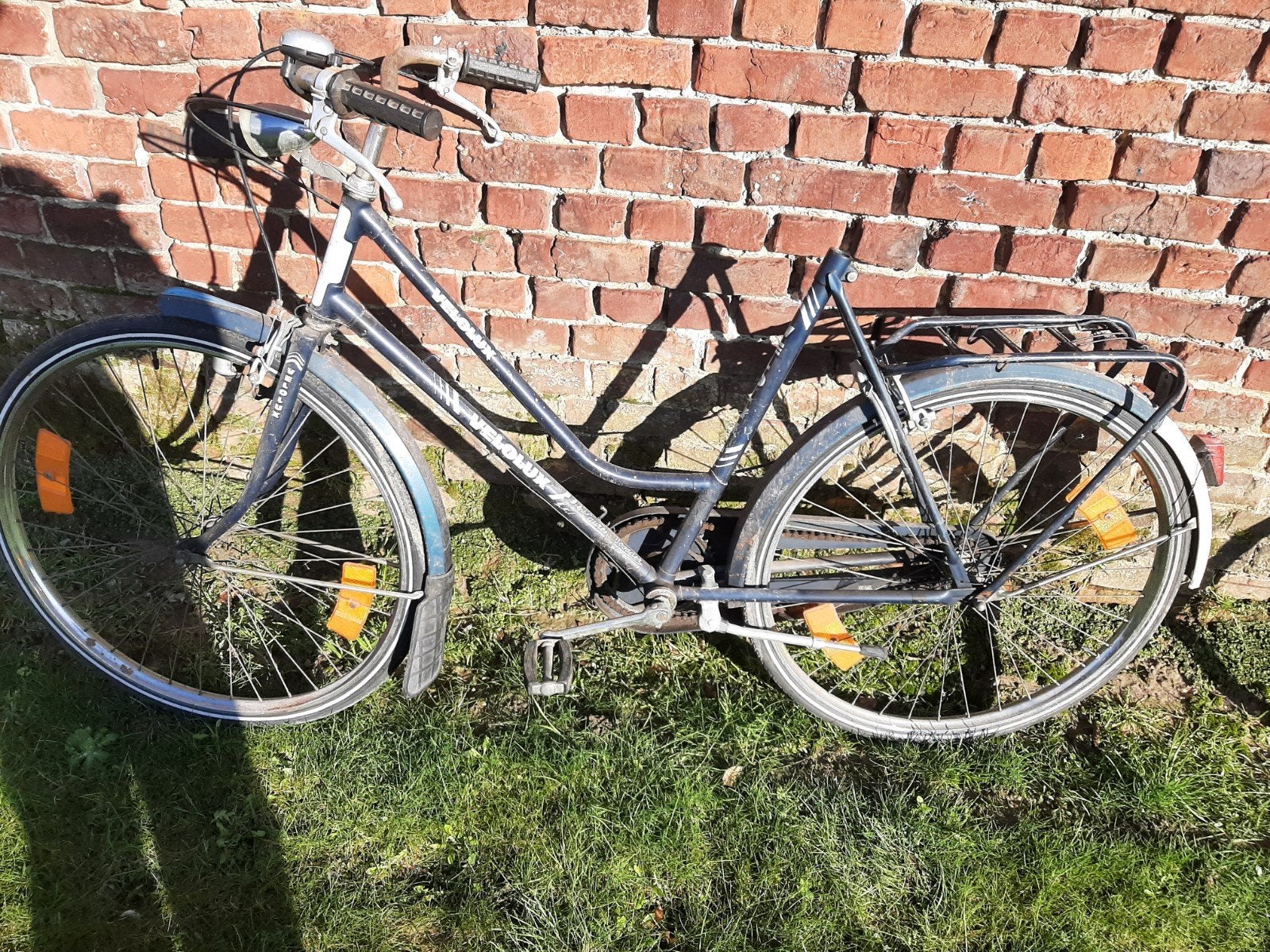 Oude damesfiets, Ophalen