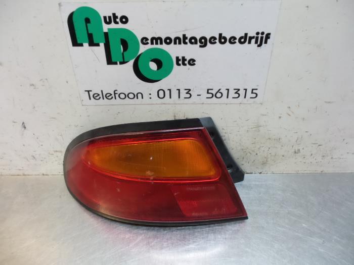Achterlicht links van een Mazda 323F (323F BA 94-), Auto-onderdelen, Verlichting, Gebruikt, 3 maanden garantie, Ophalen of Verzenden