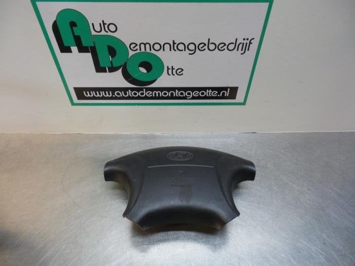 Airbag gauche (volant) d'un Hyundai Coupe (Coupe 96-), -, 3 mois de garantie, Utilisé, Hyundai