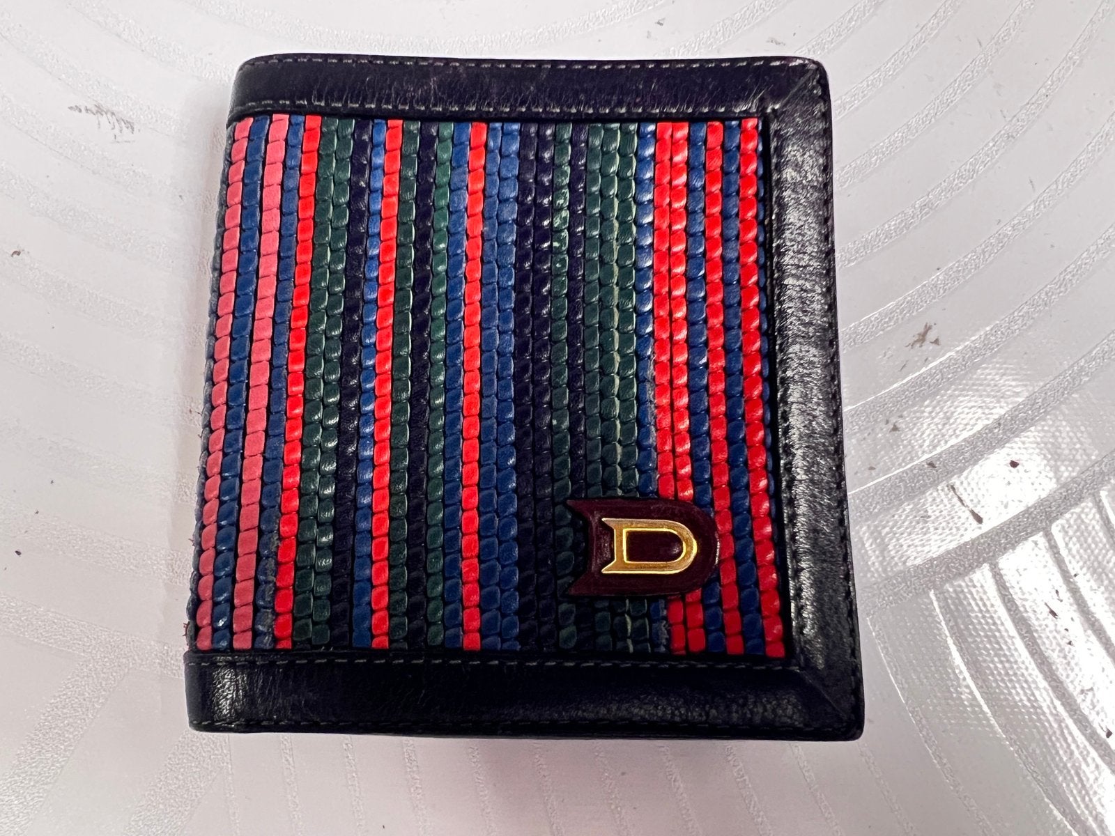 DELVAUX VEELKLEURIGE PORTEMONNEE VAN GEVLOCHTEN LEER - DE, Ophalen of Verzenden, Zo goed als nieuw