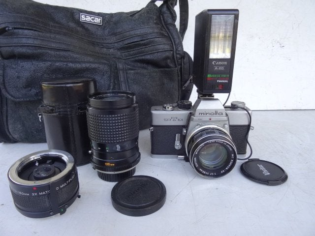 MINOLTA SRT101-obj MC Rokkor 1,7/55mm+ telecamera +..., Audio, Tv en Foto, Fotocamera's Analoog, Ophalen of Verzenden, Minolta