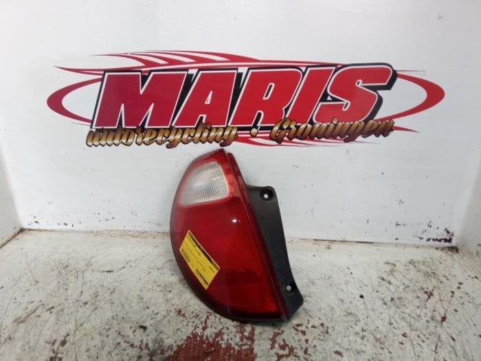 Feu arrière gauche d'un Daihatsu Sirion, Daihatsu, -, -, 3 mois de garantie