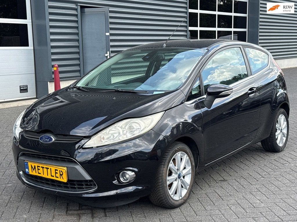Ford Fiesta 1.4 Titanium | airco | cruise control, Voorwielaandrijving, Gebruikt, 4 cilinders, Zwart