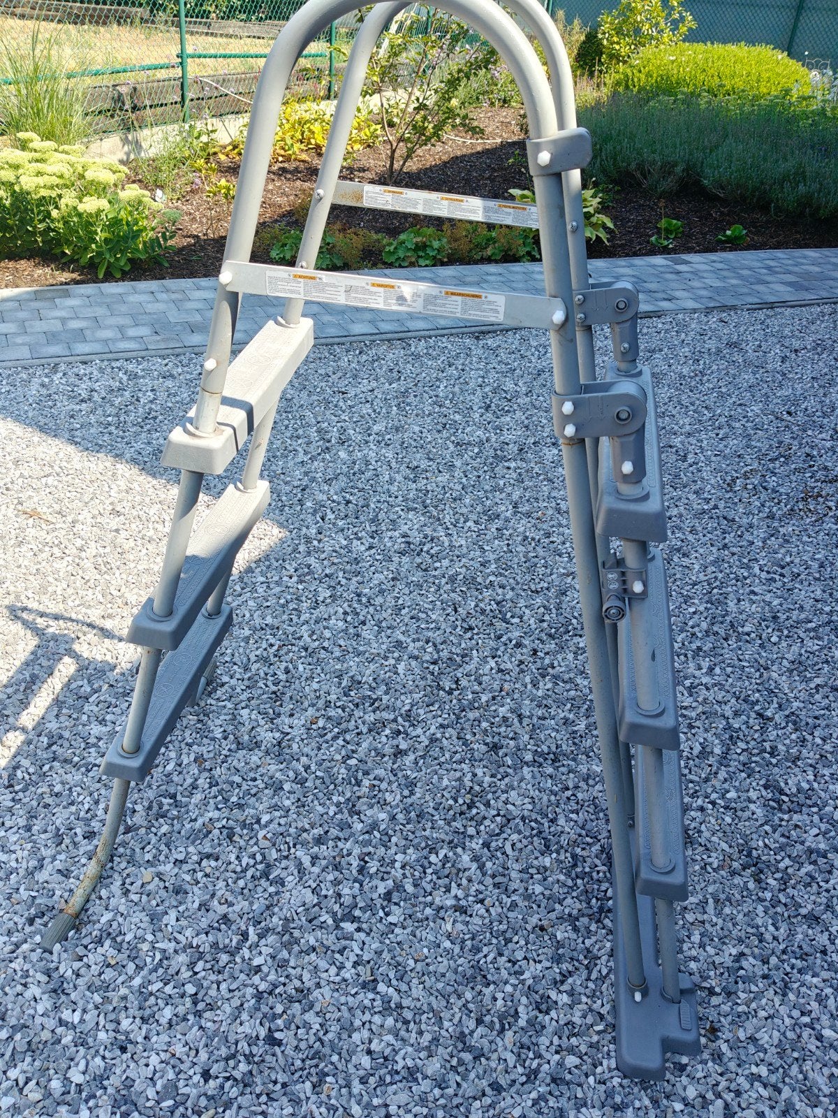 Zwembadladder, Ophalen