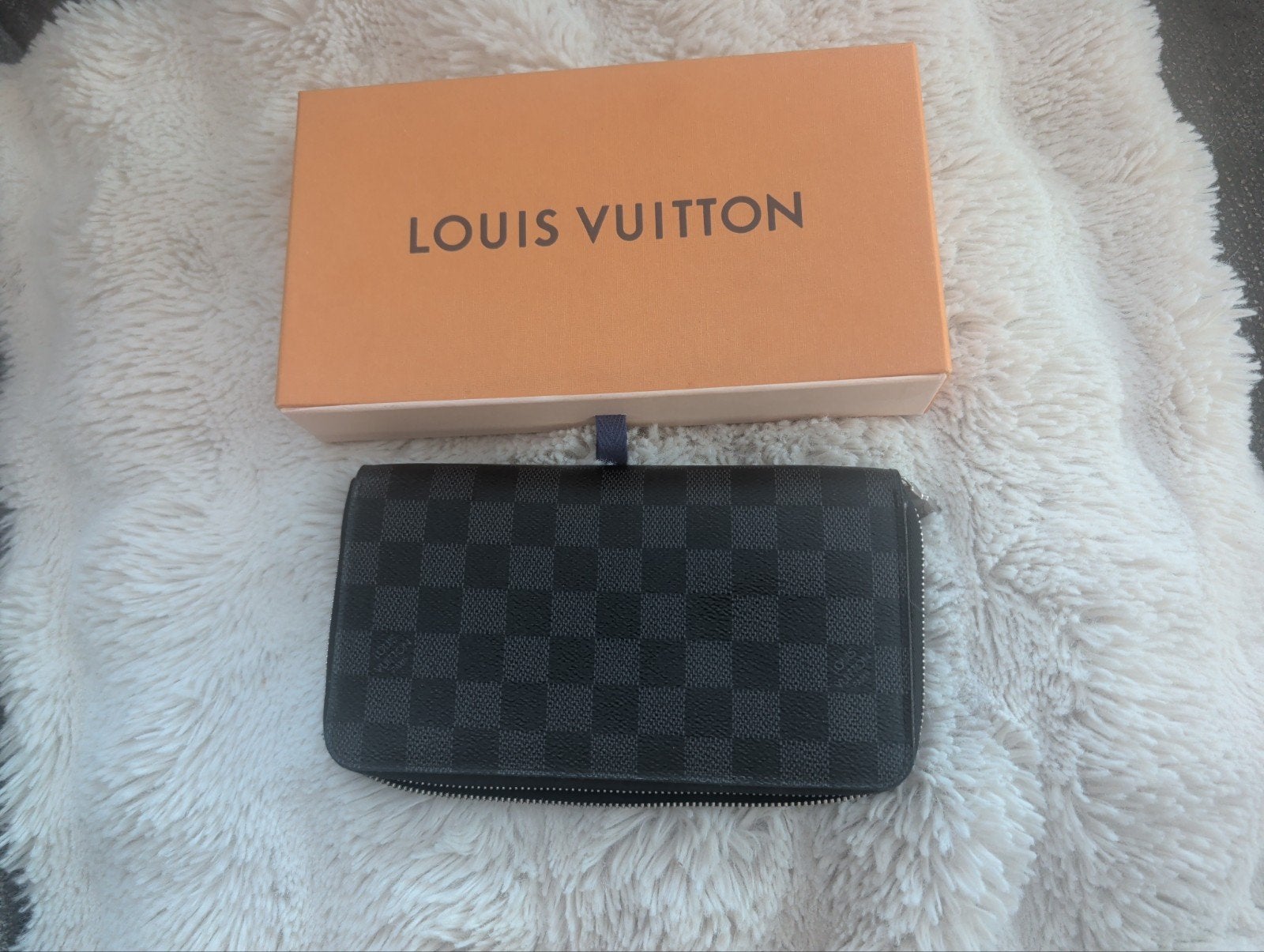 Louis Vuitton XL Zippy, Ophalen