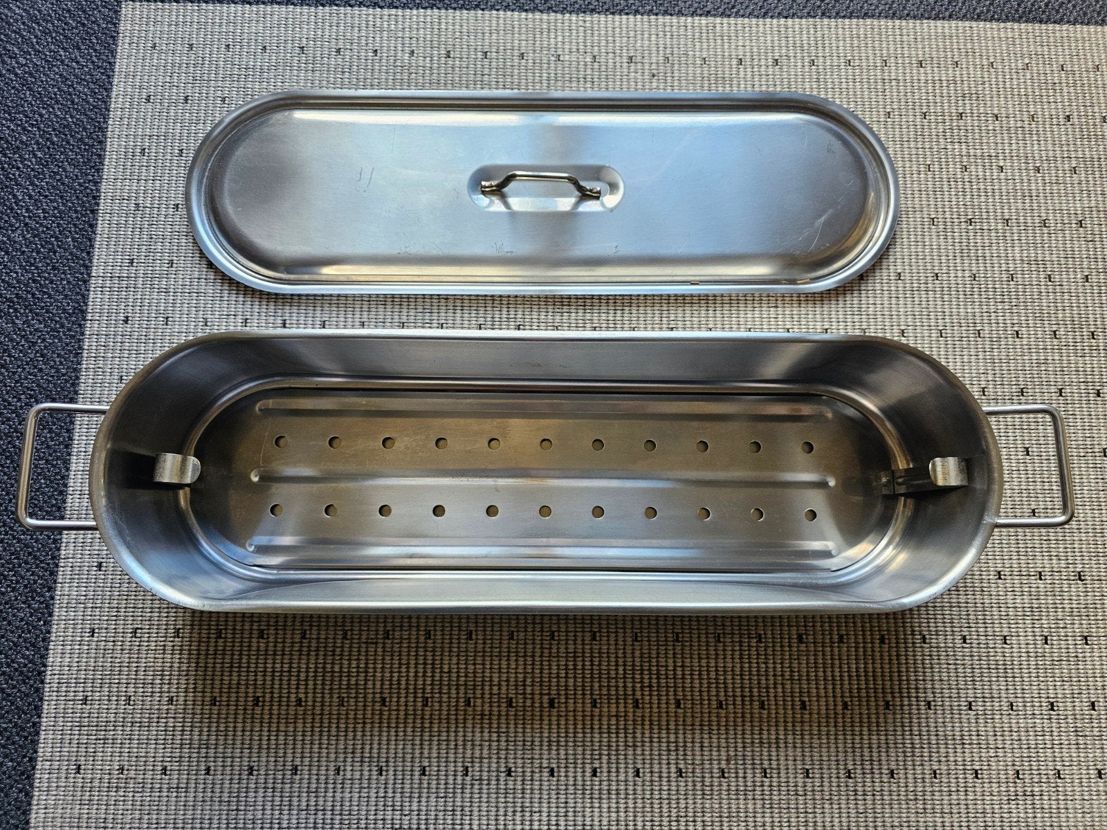 Vis kookpot in inox, Ophalen
