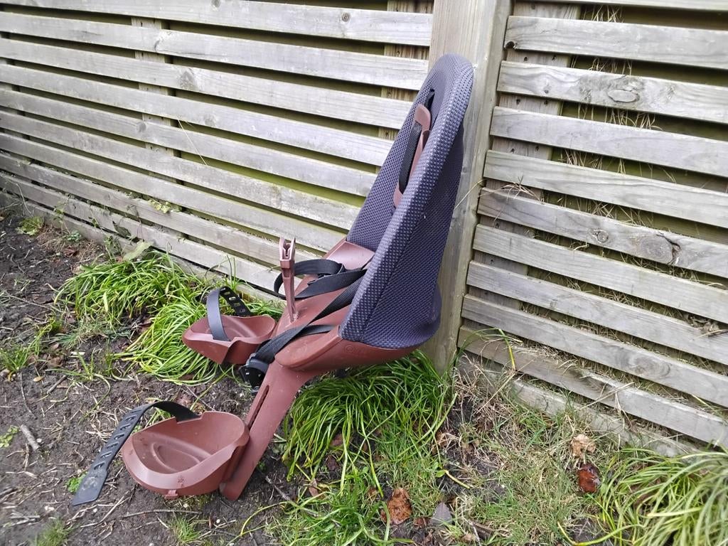 Fietsstoeltje vooraan, Ophalen