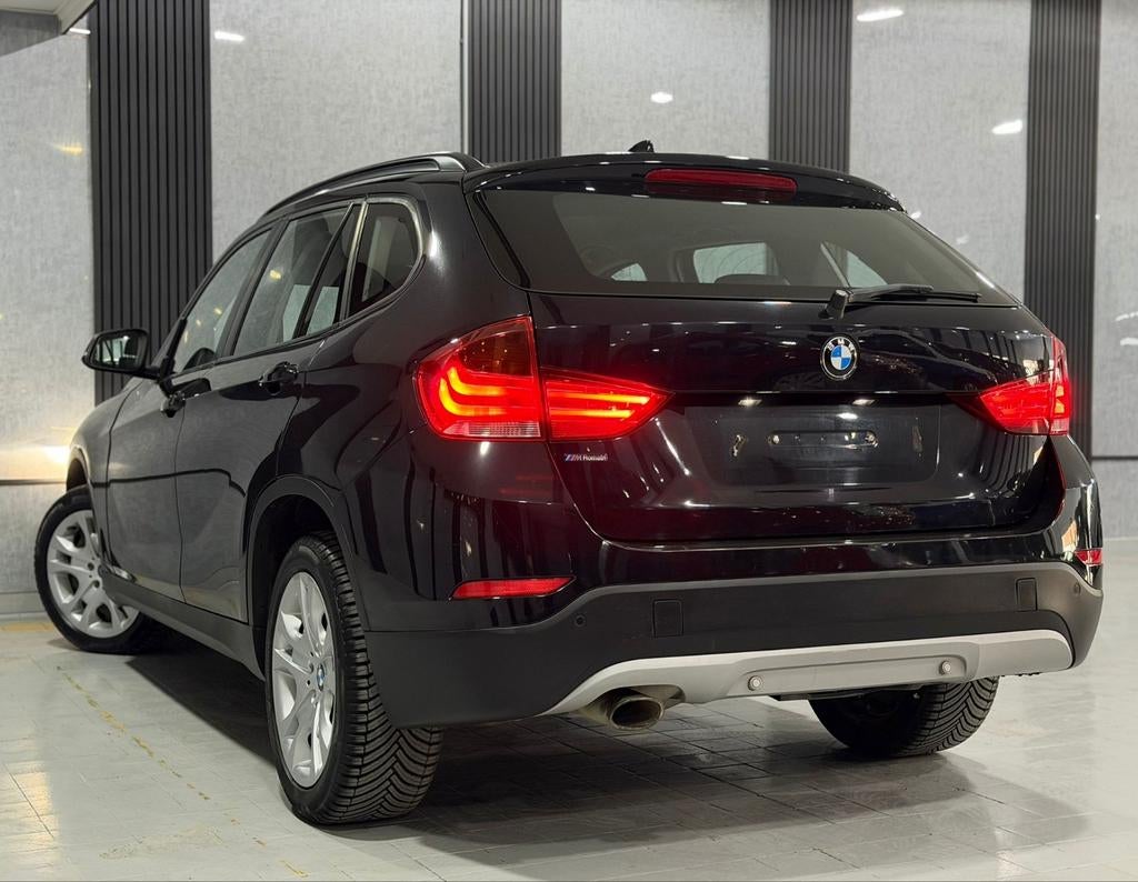 BMW X1 S DRIVE 16D FACELIFT AUTOMATISCHE TRANSMISSIE MET VOL, Auto's, Euro 5, Zwart, 4 cilinders, Zwart