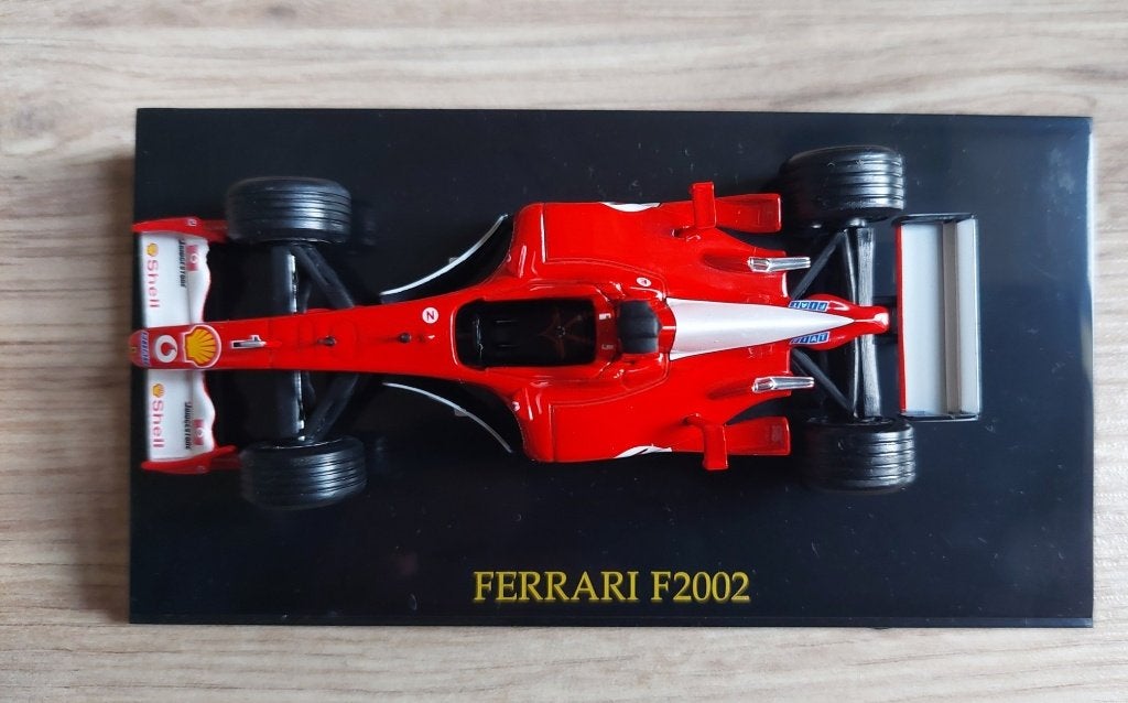 modelauto Formule 1 : 1/43 Ferrari F2002 met vitrinedoos, Hobby en Vrije tijd, Ophalen of Verzenden, Nieuw, Overige typen
