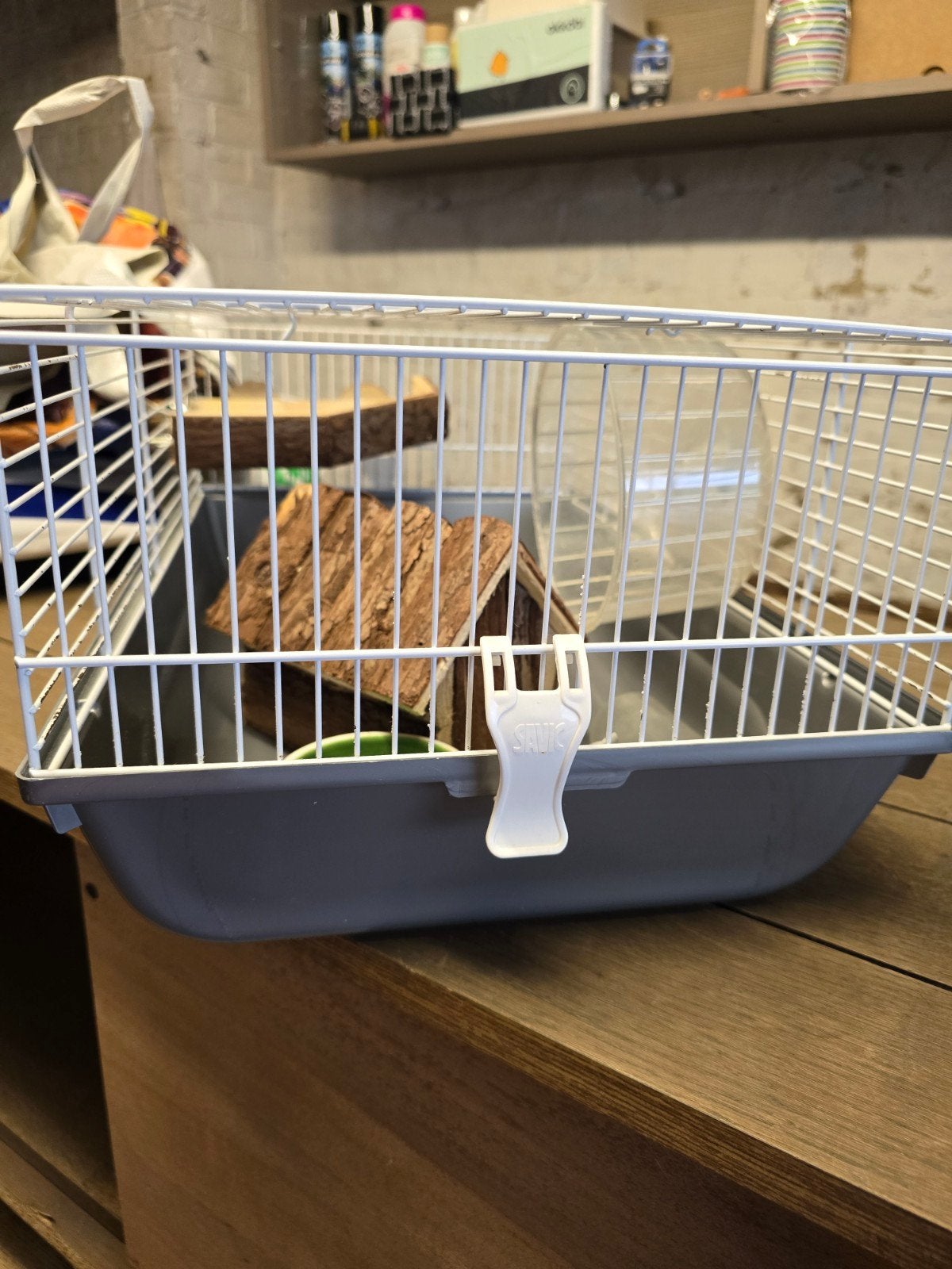 cage hamster, Ophalen