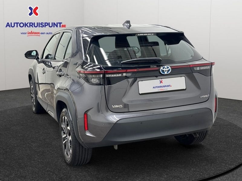 Toyota Yaris Cross 1.5Hybrid Dynamic Plus CVT, Auto's, Stof, Gebruikt, 4 cilinders, 1490 cc