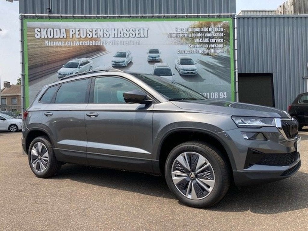 Skoda Karoq 1.0 TSI Family, Auto's, Stof, Overige kleuren, Karoq, Bedrijf